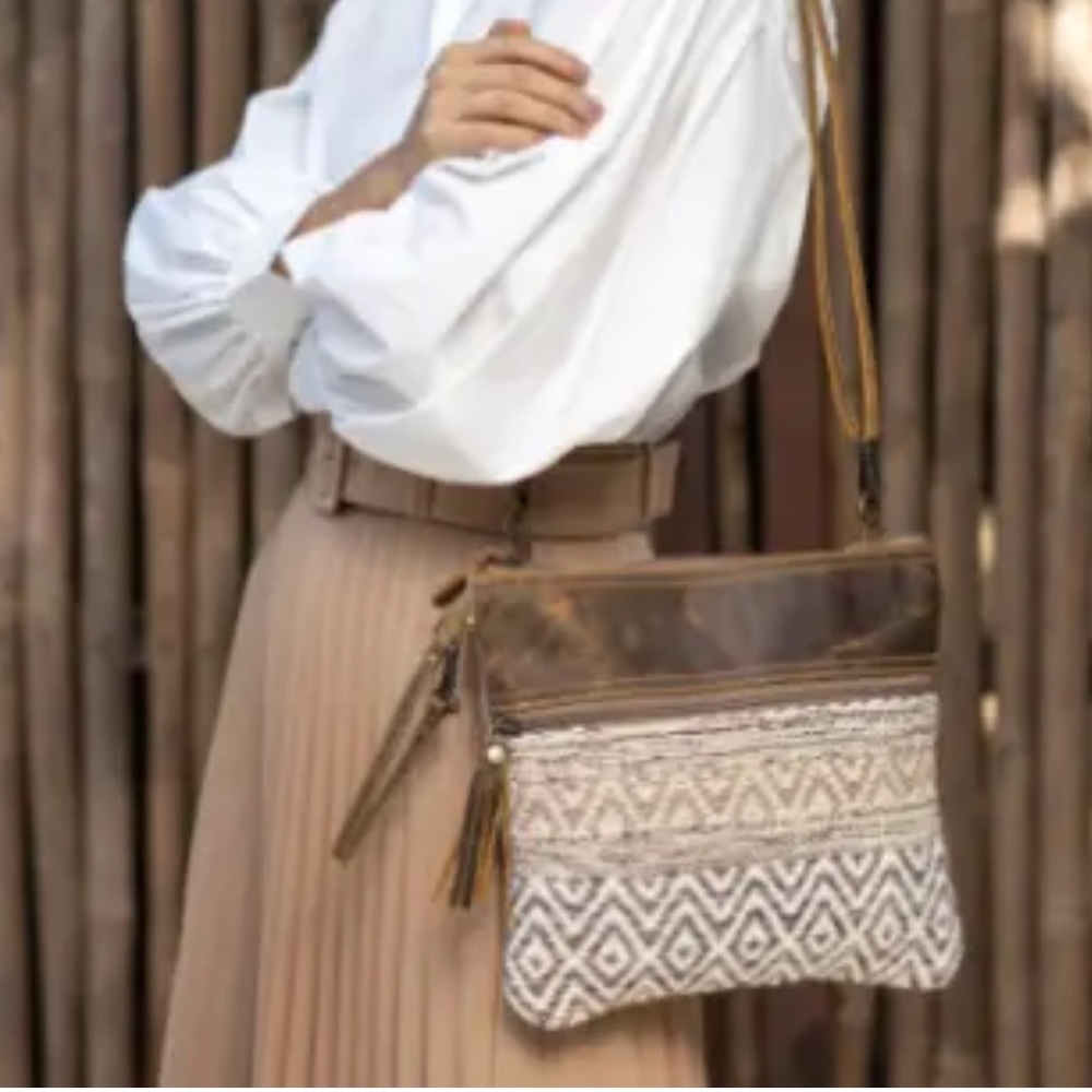 Myra bag contentment crossbody leather accents bag